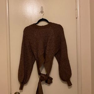 knitted sweater with an open back never worn